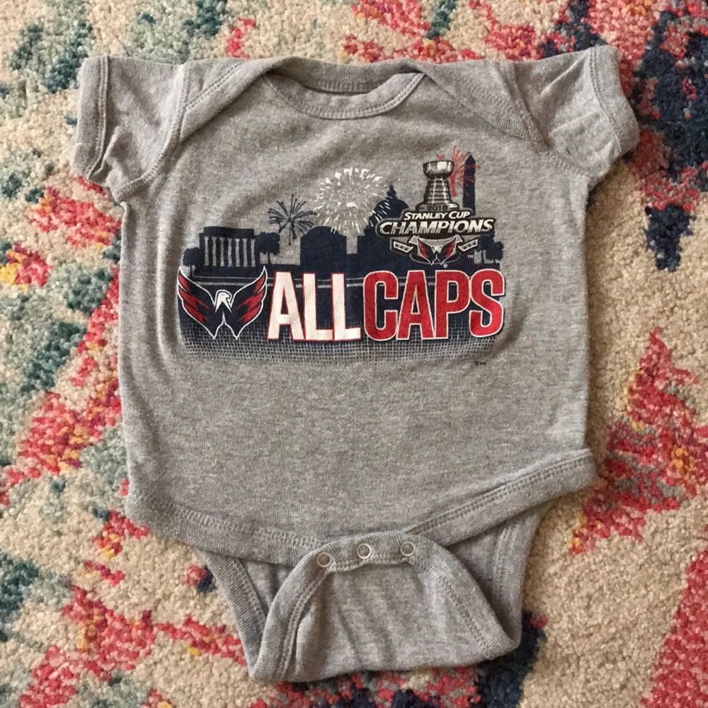 All caps onesie